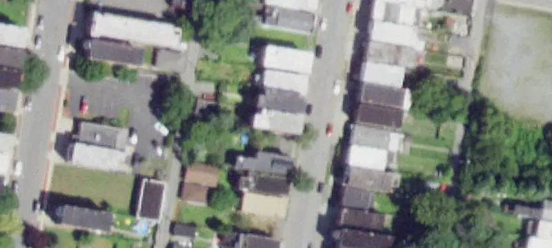 Vacant Triplex with Detached Garage