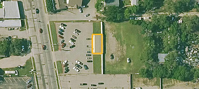 Hard-Surfaced Parking Site with Office