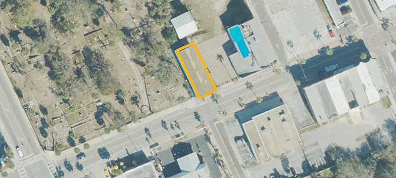 Commercial Land with Improved Buildings