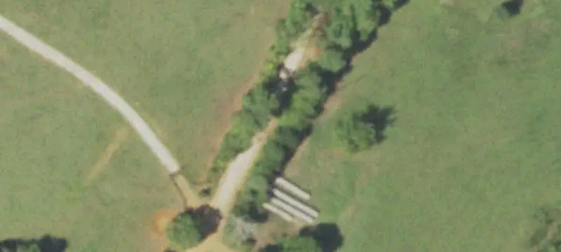 Fenced Agricultural Land with Pond