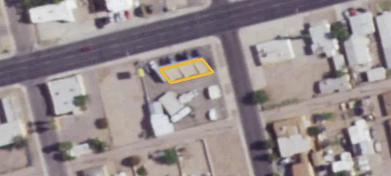 Fenced Commercial Corner Lot