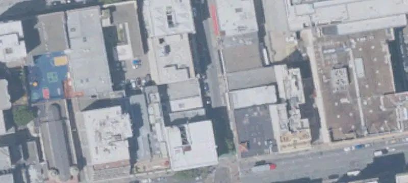 Three-Story Mixed-Use Corner Building