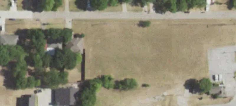 Corner Commercial Land with Buildings
