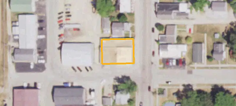 Corner Auto Shop with Drive-In Doors