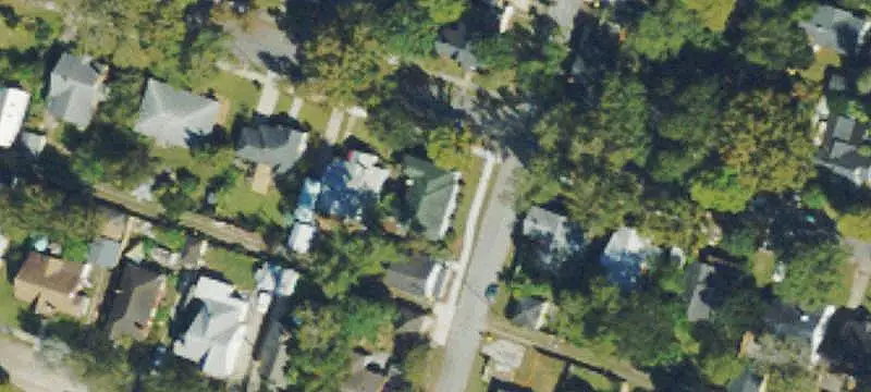Brick Triplex with Two Buildings