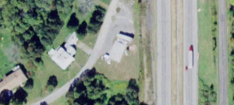 Highway Commercial Land with Improvements