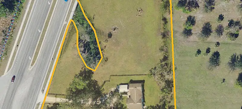 Commercial Land with Existing Improvements