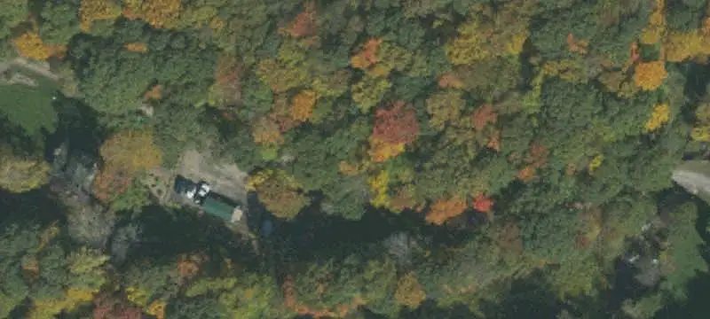 Mountaintop Farmland with Wooded Acreage