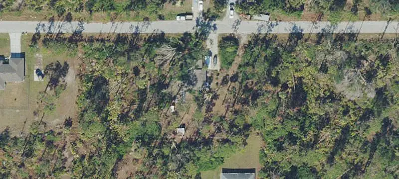 Three-Unit Triplex with Wooded Grounds