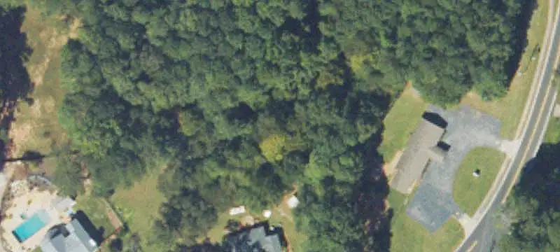 Commercial Land with Brick Ranch