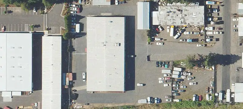 Remodeled Fenced Industrial Building
