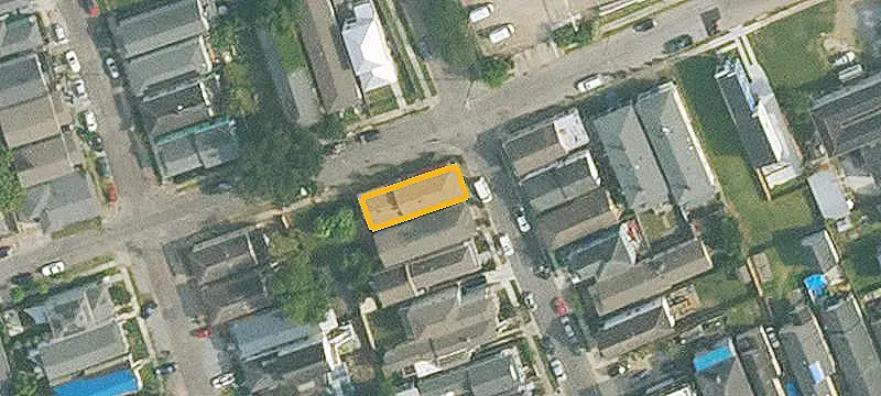 Corner-Lot Duplex with Courtyard