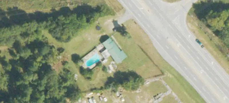 Commercial Land with Existing Home