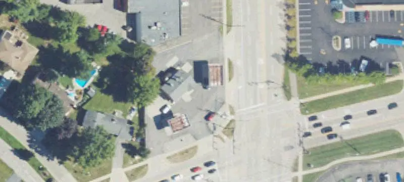 Corner Retail Storefront with Drive-Through