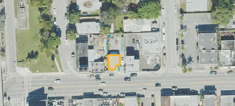 Commercial Land with Existing Buildings