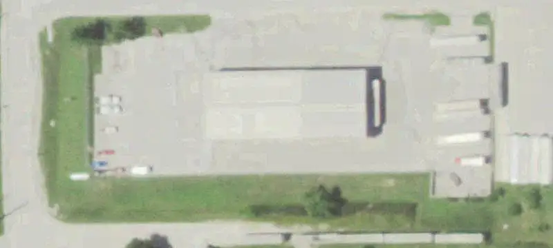 Warehouse Building with Fenced Yard