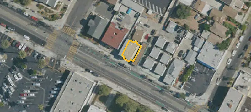 Two-Story Apartment Building With Commercial Space