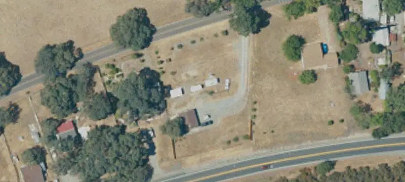 Treed Commercial Land with Improvements