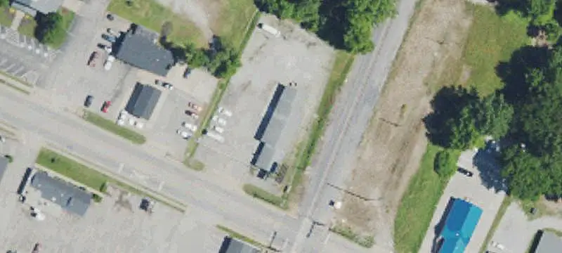 Auto Shop With Billboard Sign