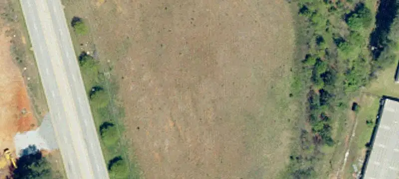 Commercial Land with Roadside Signage