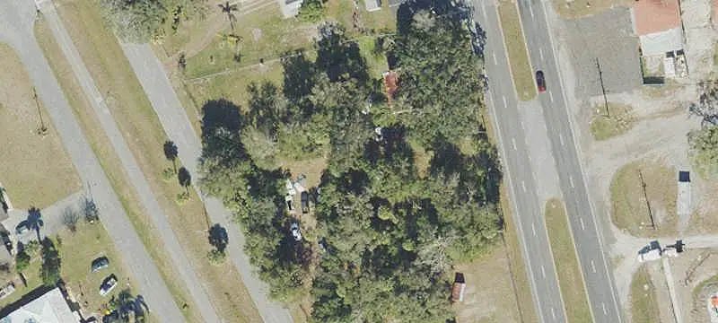 Commercial Land with Four-Unit Building