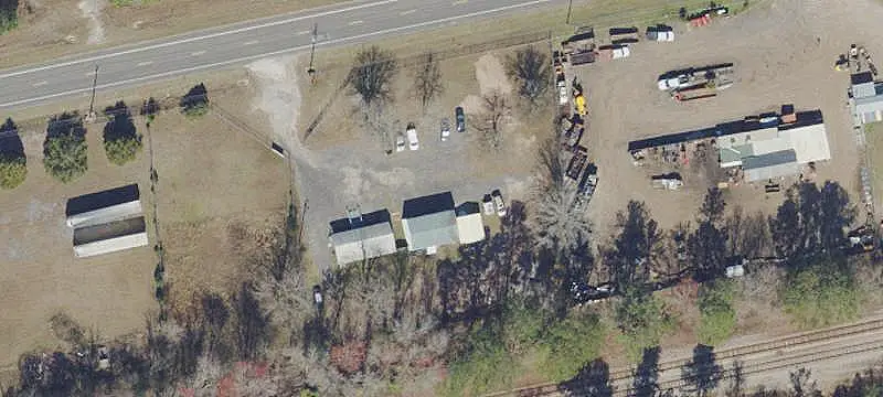 Fenced Auto Shop with Car Lifts