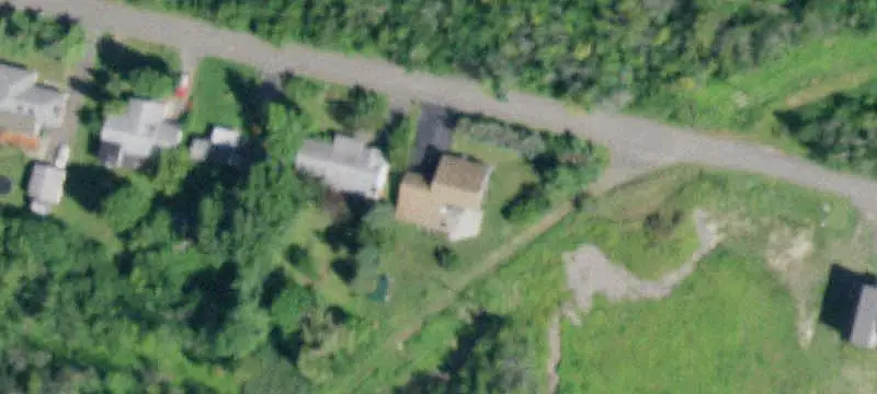 Unfinished Duplex With Attached Garage
