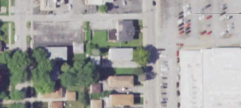 Brick Triplex With Detached Garage