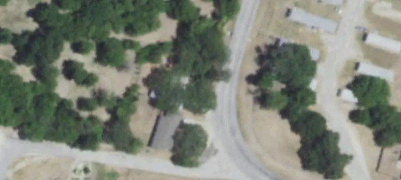 Level Commercial Land with Existing Homes