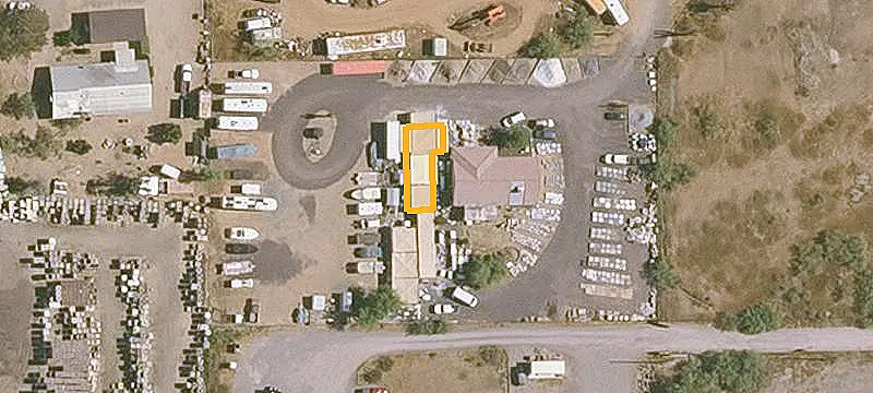 Fenced Commercial Land With Improvements