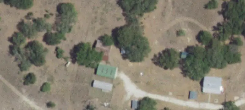 High-Fenced Ranch With Homes