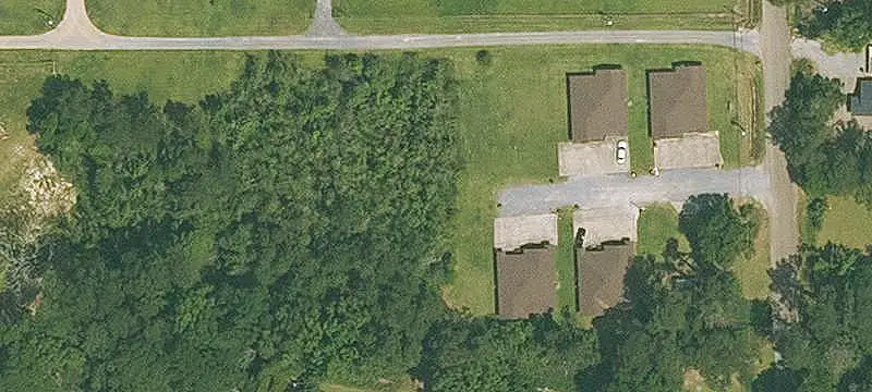 Occupied Apartment Building with Expansion Land