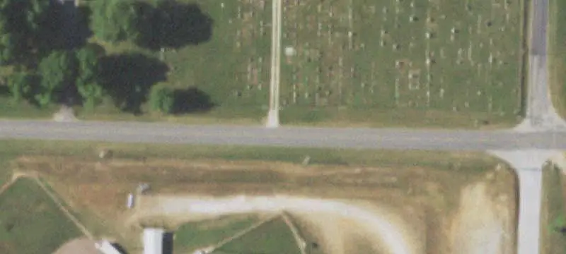 Fenced Farmland with Open-Sided Barn