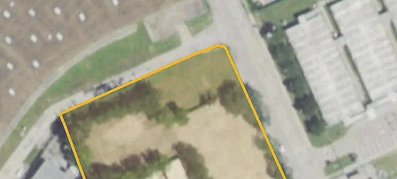Fenced Corner Commercial Lot