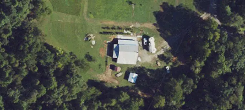 Creekfront Farmland with Barn