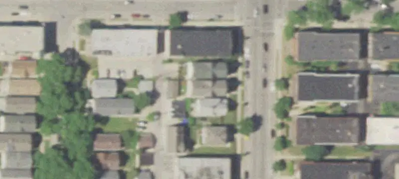 Duplex With Three-Car Garage