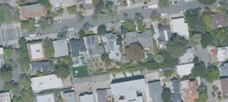 Updated Tudor Revival Triplex