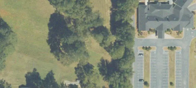 Commercial Land with Existing Buildings