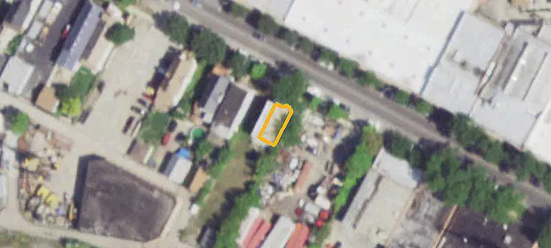 Fenced Commercial Land with Curb Cut