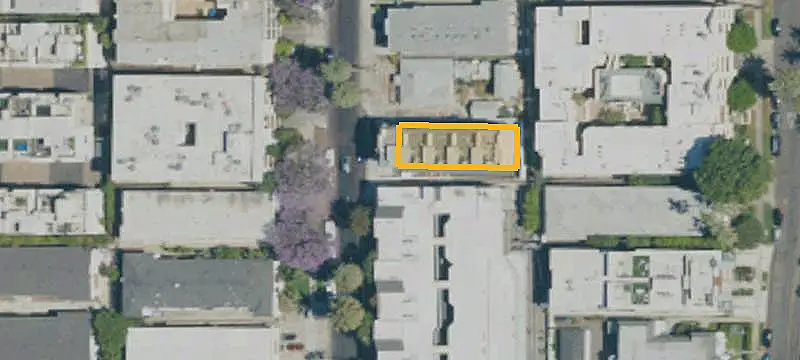 Apartment Building with Rooftop Deck