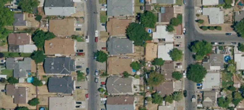 Occupied Duplex with Two-Car Garage