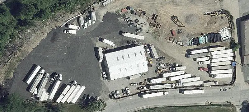 Fenced Industrial Building with Drive-Through