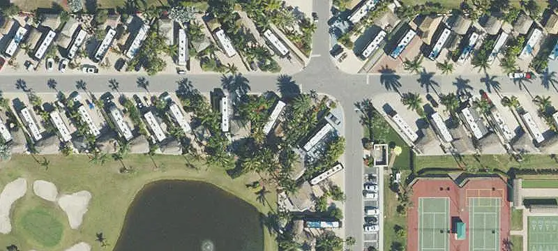 Lake-Backed RV Lot with Tiki Structures