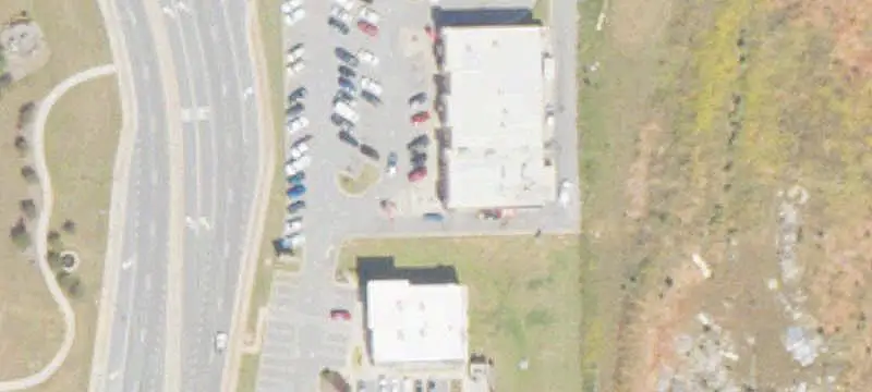 Occupied Shopping Center with Drive-Throughs