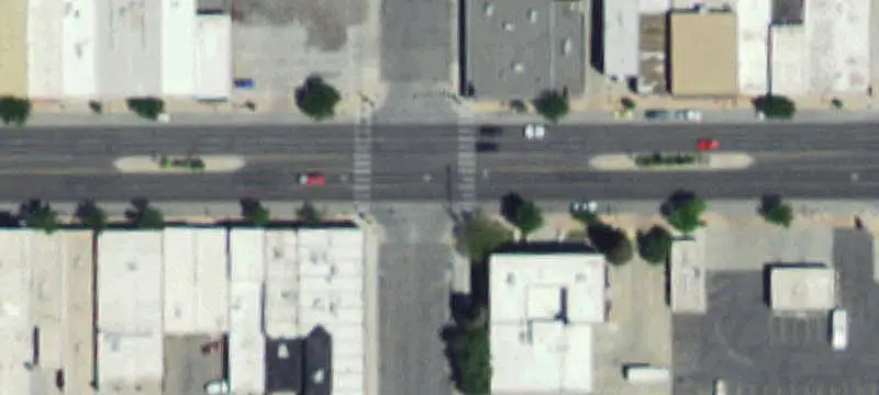 Corner Storefront with Paved Parking