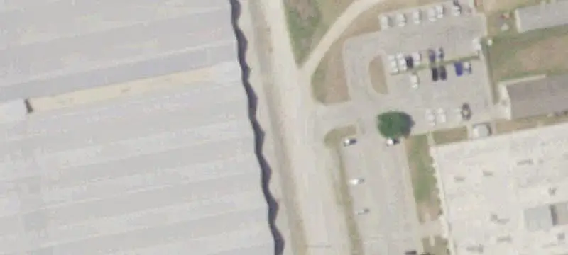 Manufacturing Facility with Greenhouses