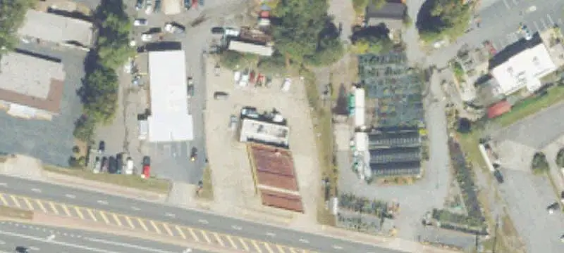 Vacant Convenience Store with Billboard