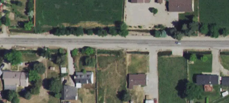 Farmhouse on Agricultural Acreage