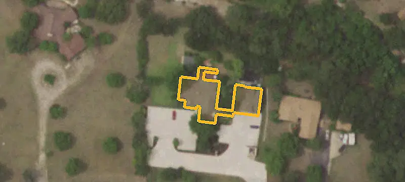 Commercial Land with Enclosed Improvements