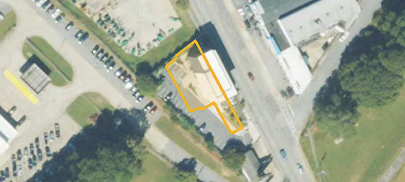 Three-Story Mixed-Use Building with Rooftop